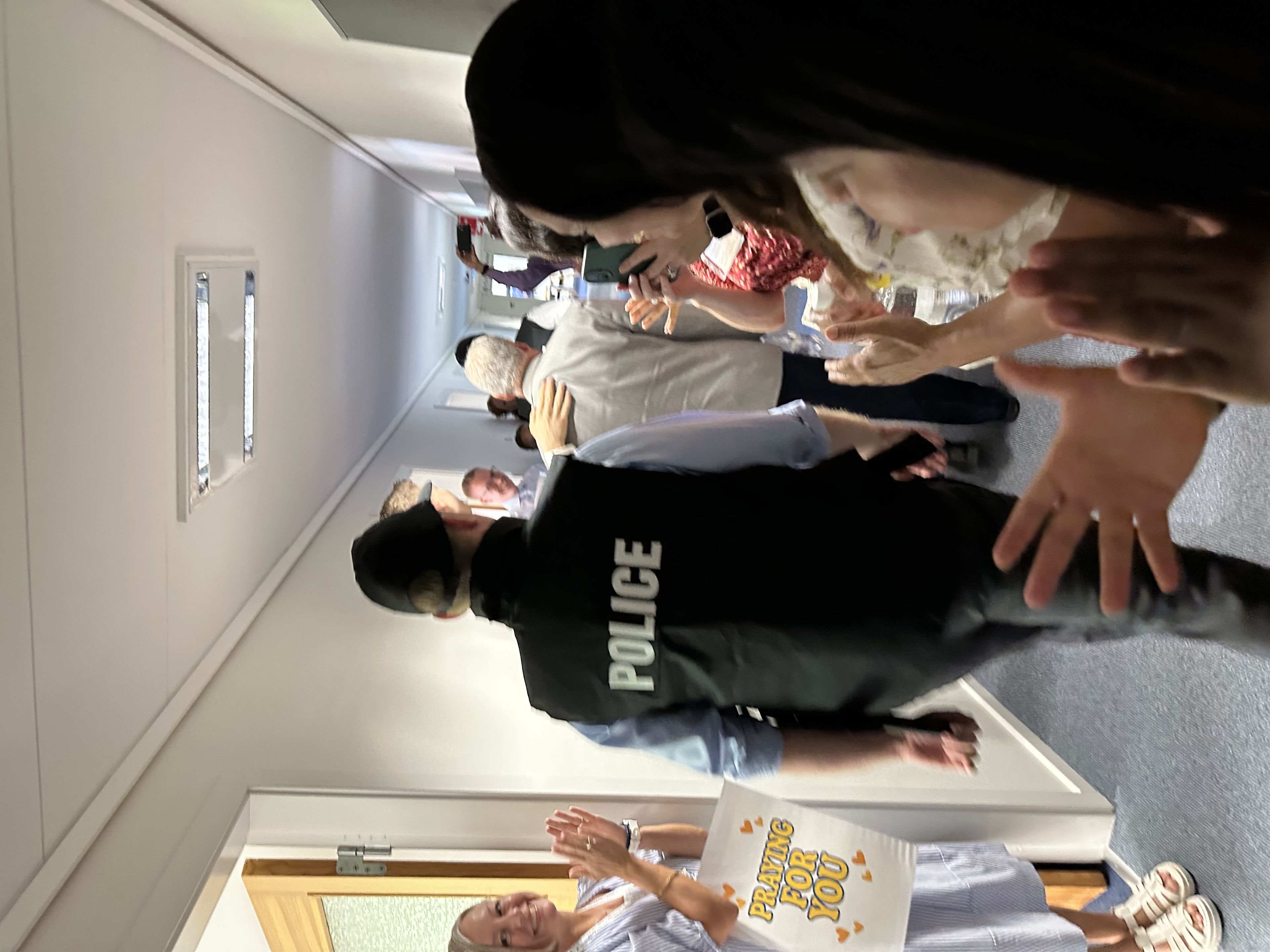 The police escorting one of our delegates for his faith